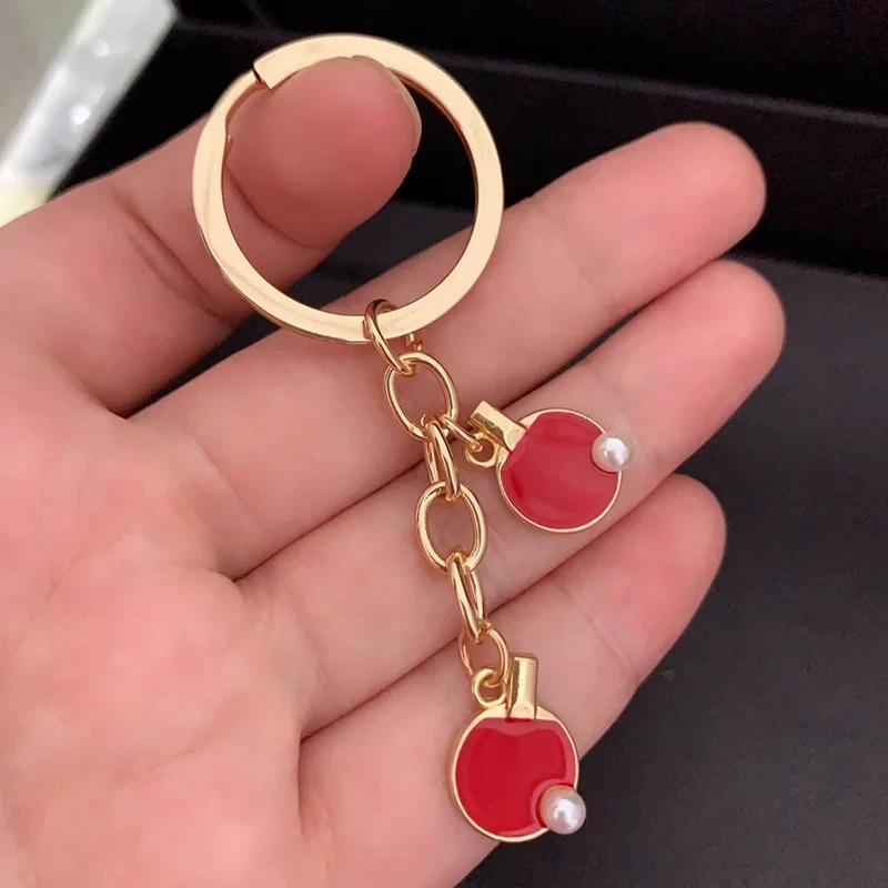 Schwarz Rot Sport Tischtennis  – Table Tennis Keychain Bewertung und Preis